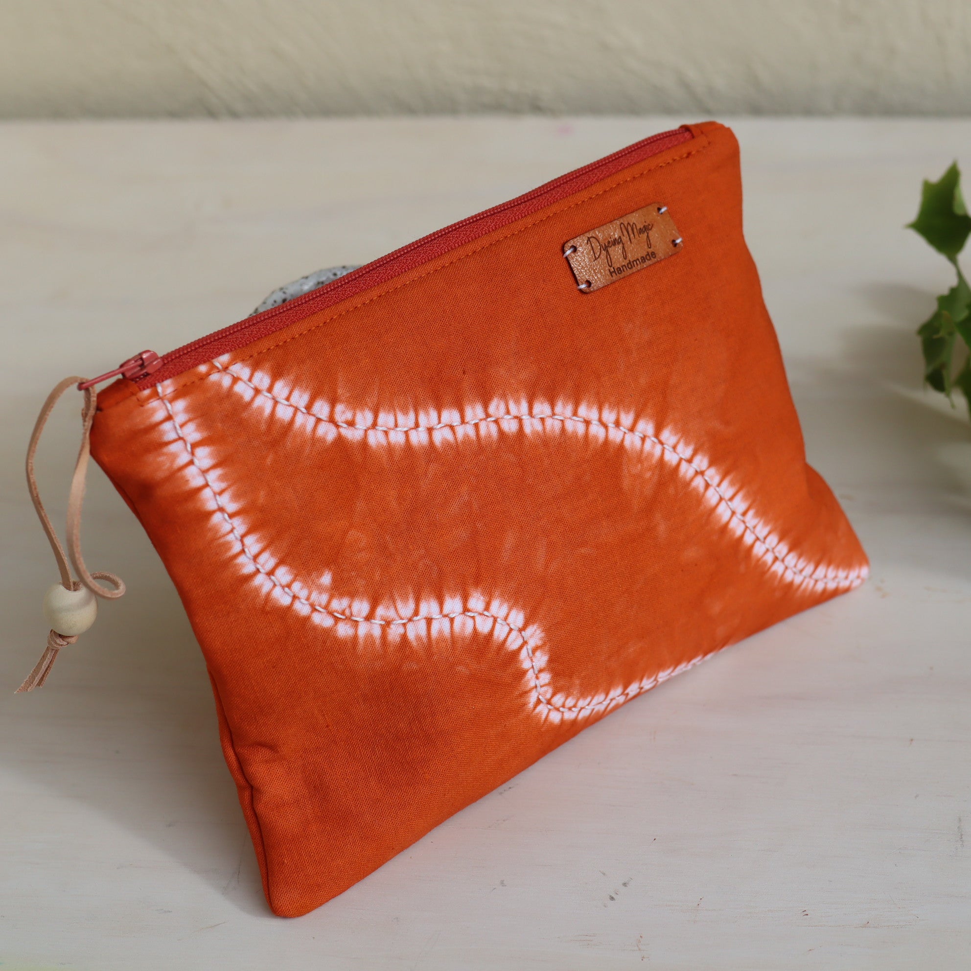 Shibori dyed small zipper pouch, ochre