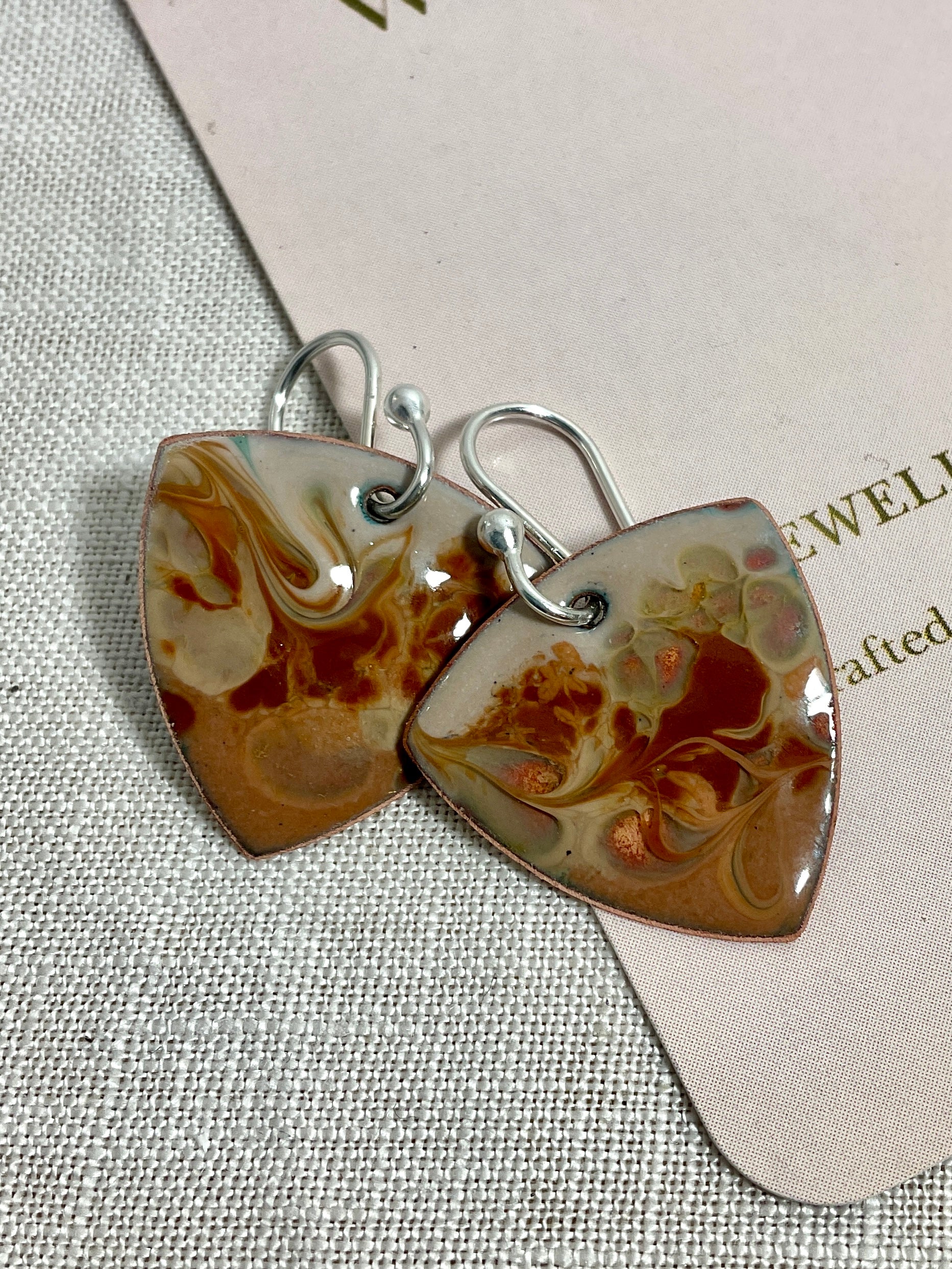 Earthy swirl. Brown and cream enamel earrings. Handmade