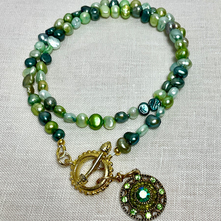 Green Pearl necklace with antique pendant. Handmade