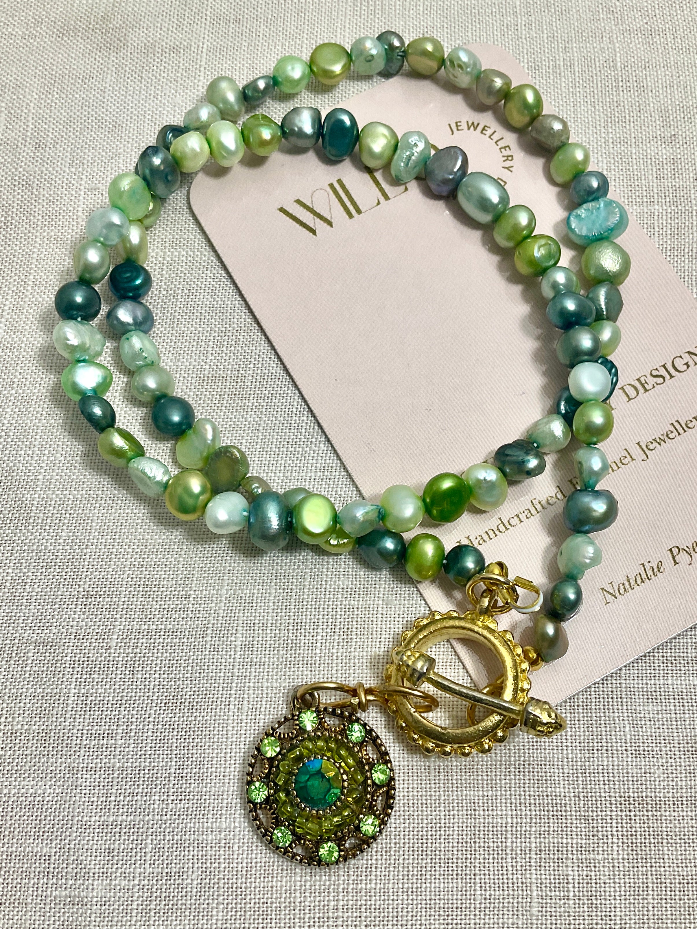 Green Pearl necklace with antique pendant. Handmade