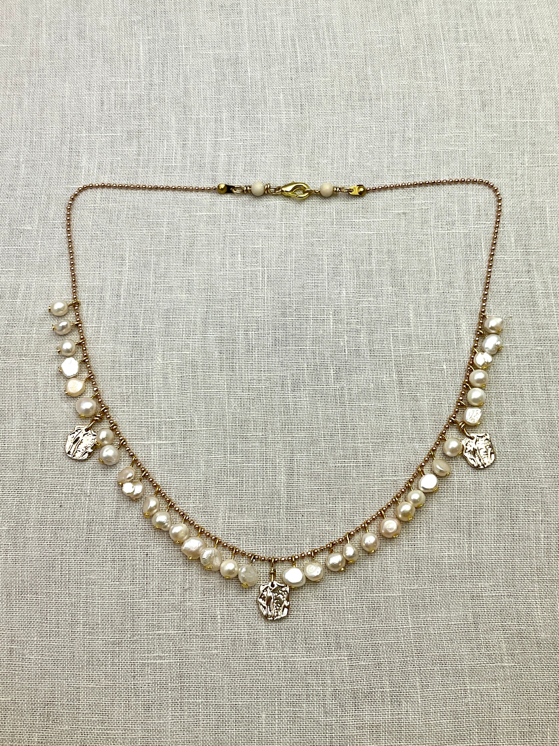 Pearl and gold charm necklace. Handmade