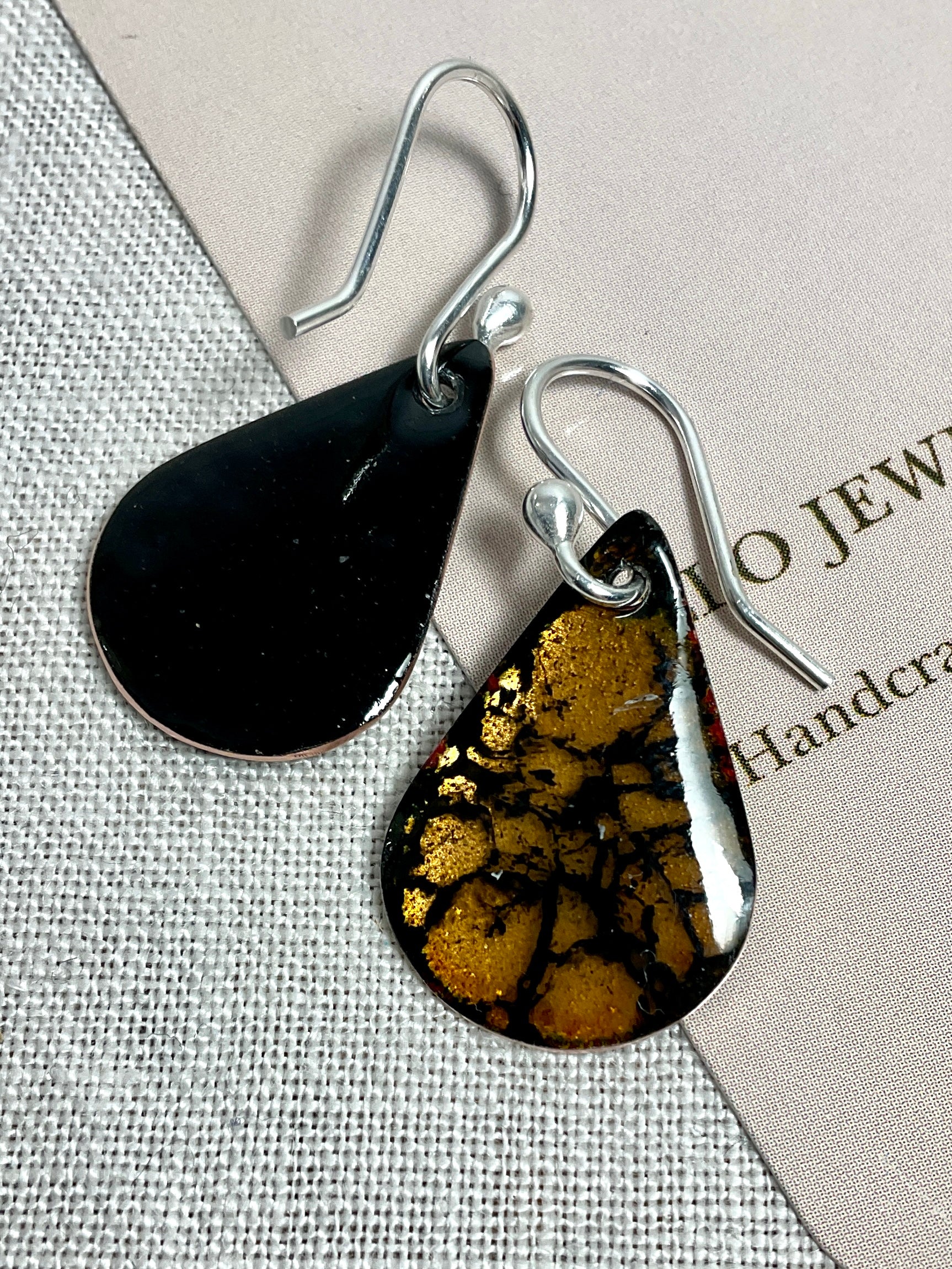 Gold teardrop enamel earrings