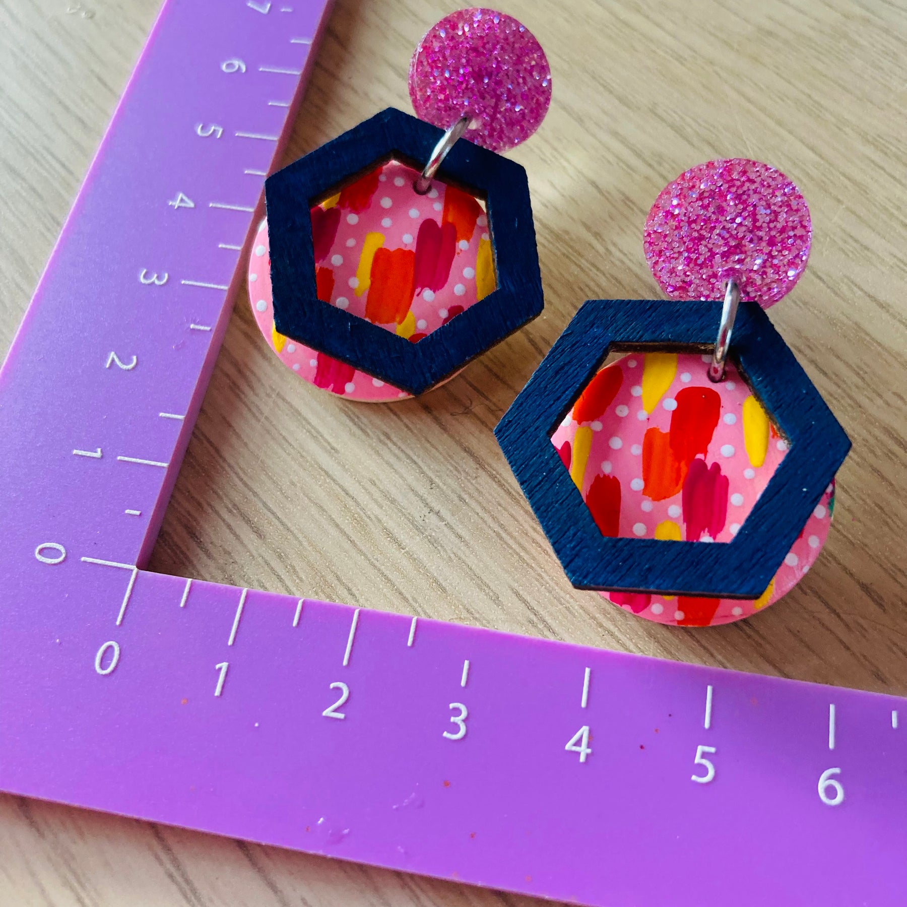 Handpainted earrings with hexagon accent
