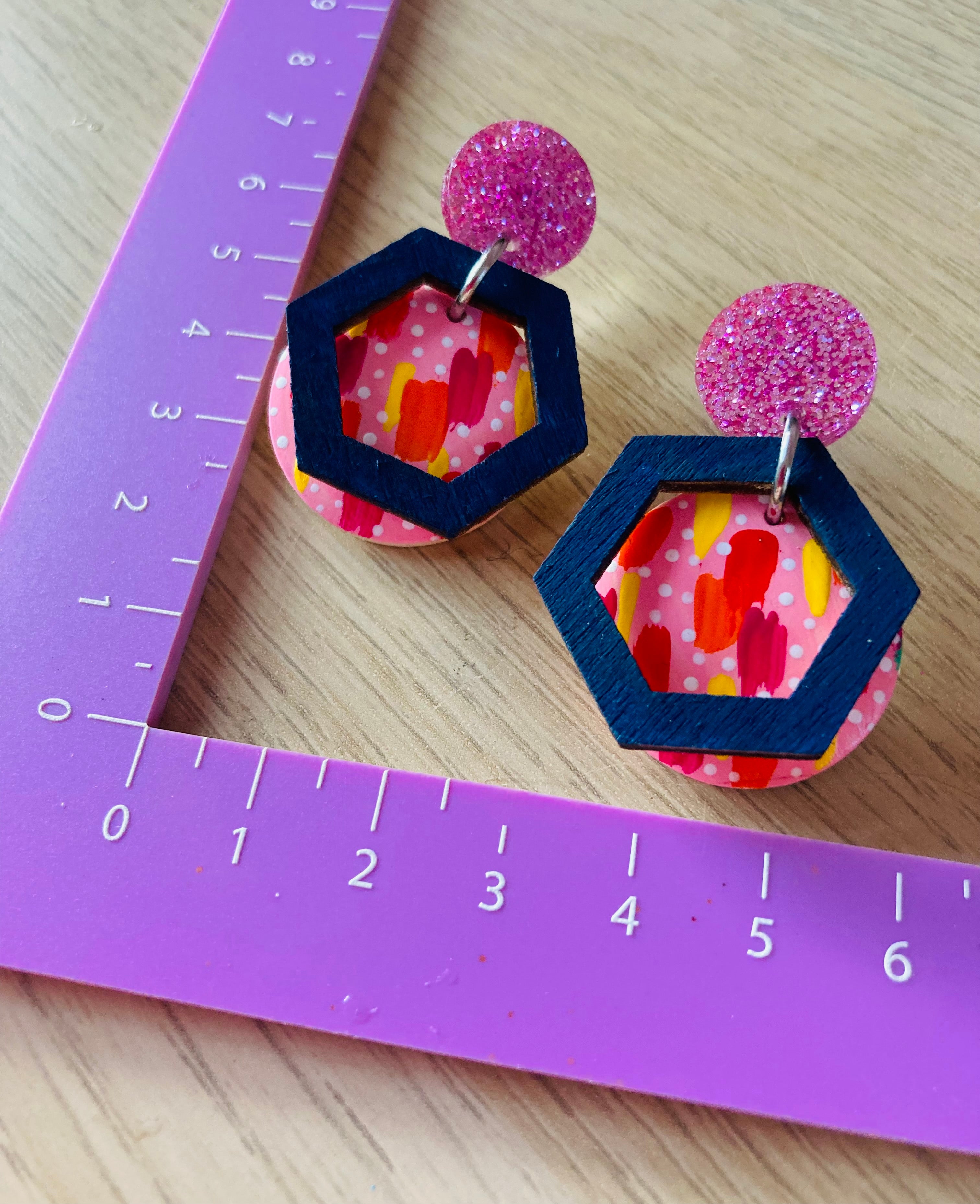 Handpainted earrings with hexagon accent