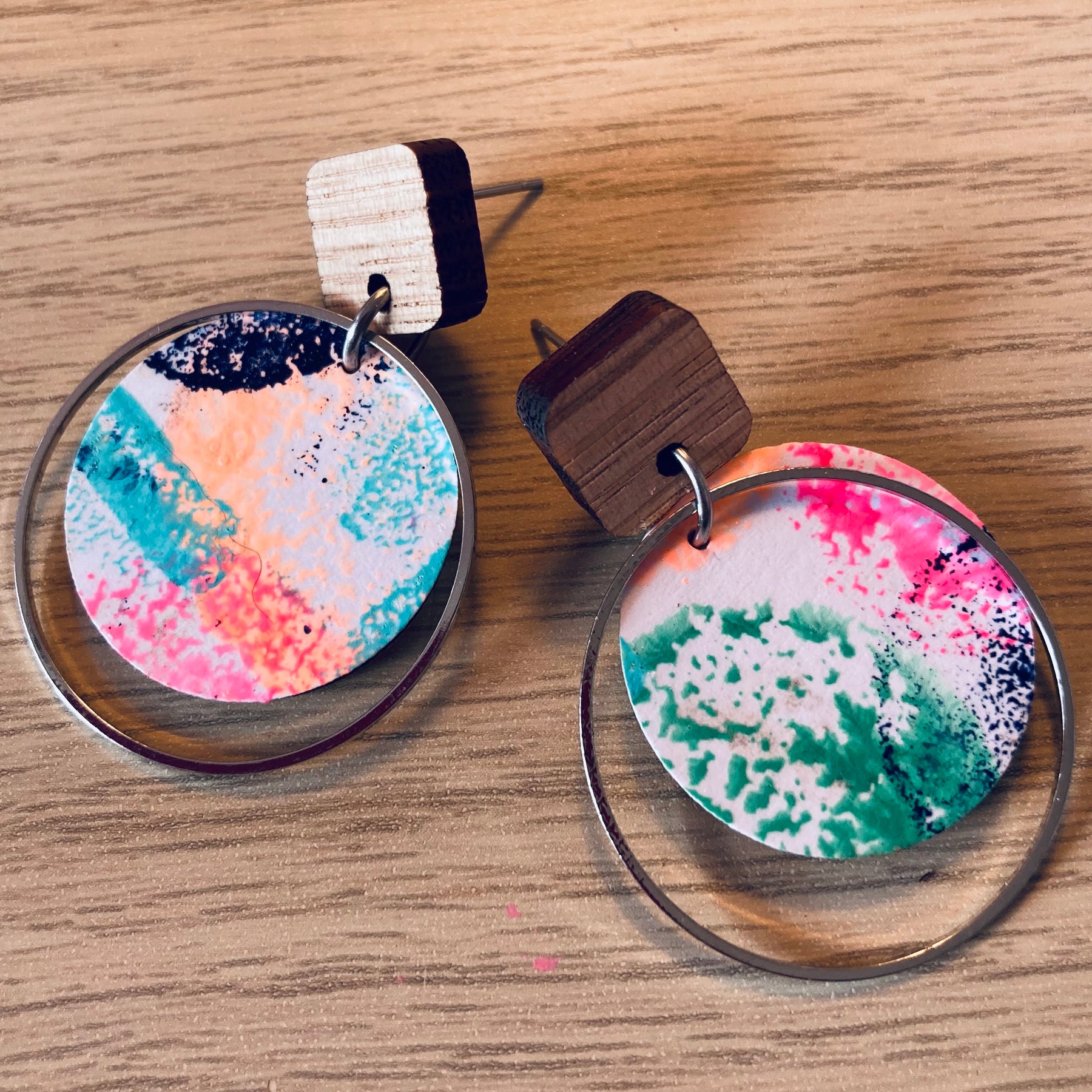 Handpainted earrings with circle embellishment