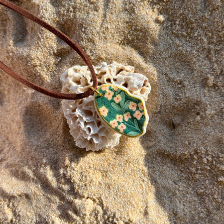 Vintage Floral Shell Pendant with Gold Edges