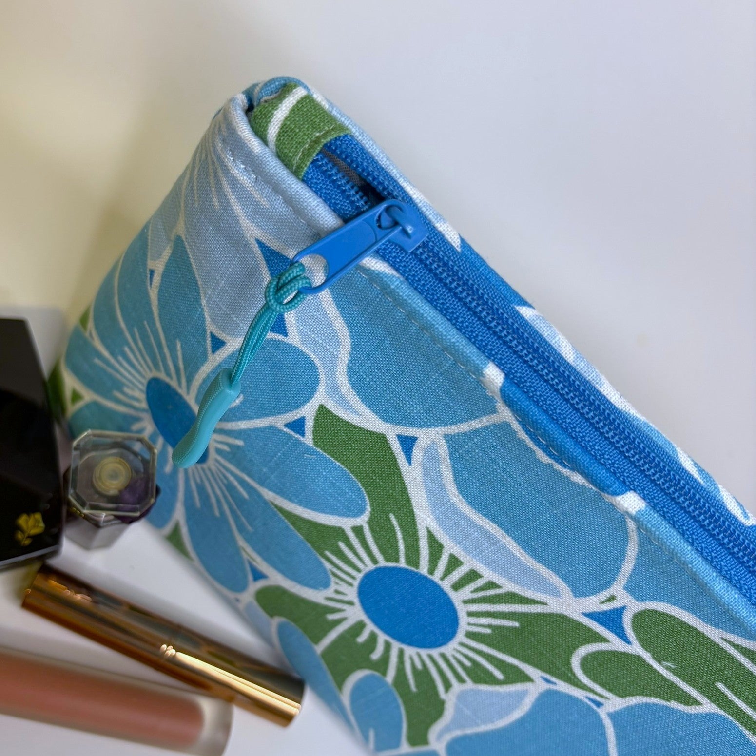 Zippered pouch - Blue and green floral linen blend fabric