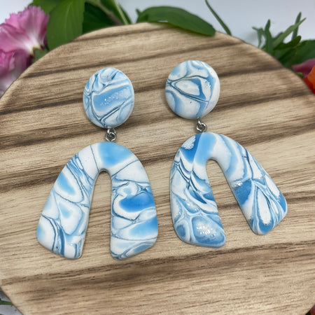 Blue and white marbled look polymer clay earrings