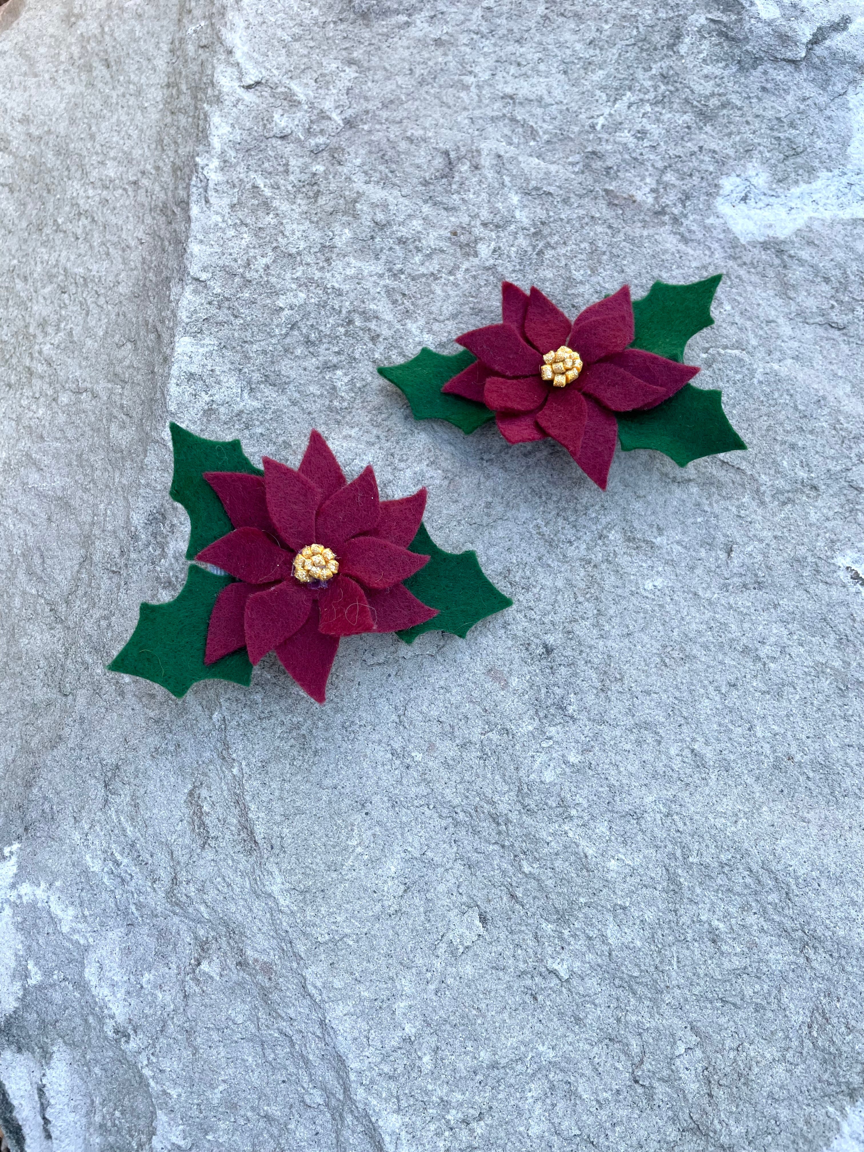Holly, poinsettia, brooches and ornaments