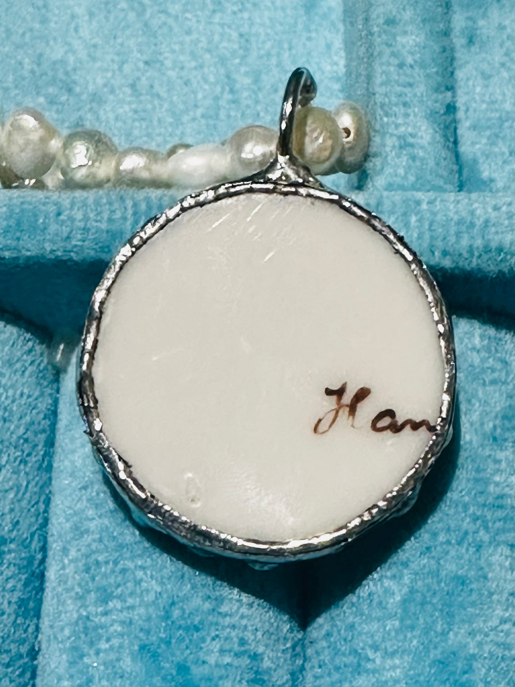 Hand painted blue floral porcelain pendant