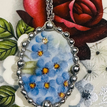 Hand painted oval porcelain pendant