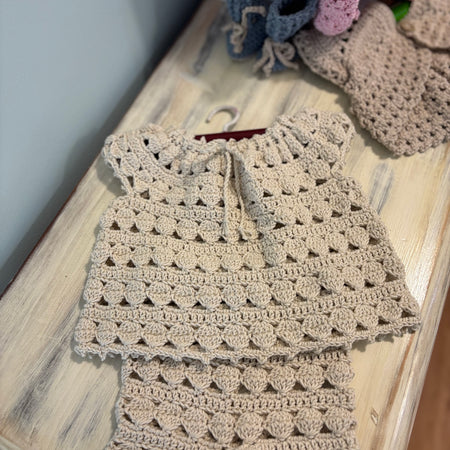 Retro style crocheted smock and matching bloomers set.