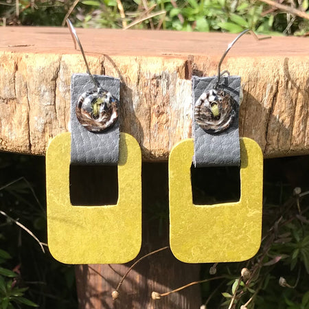 Handmade earrings made with flooring