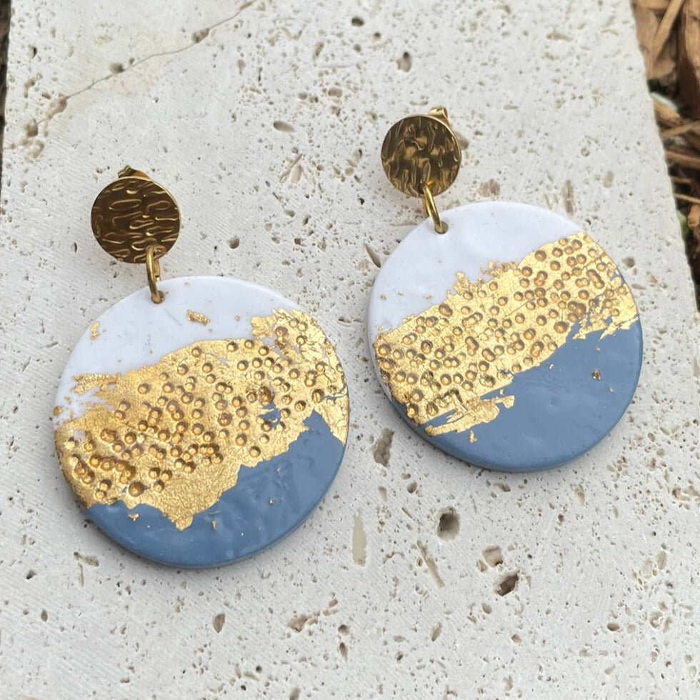 Blue white and gold hand-textured round polymer clay earrings