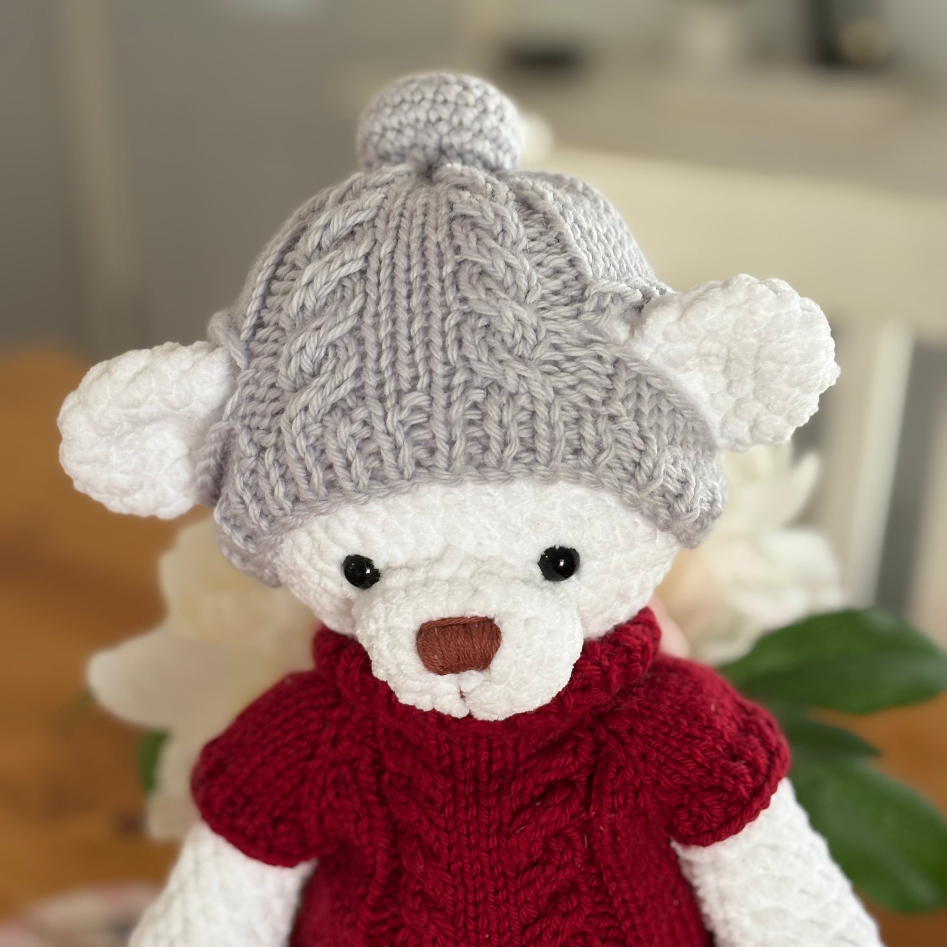 Bear in knitted clothes