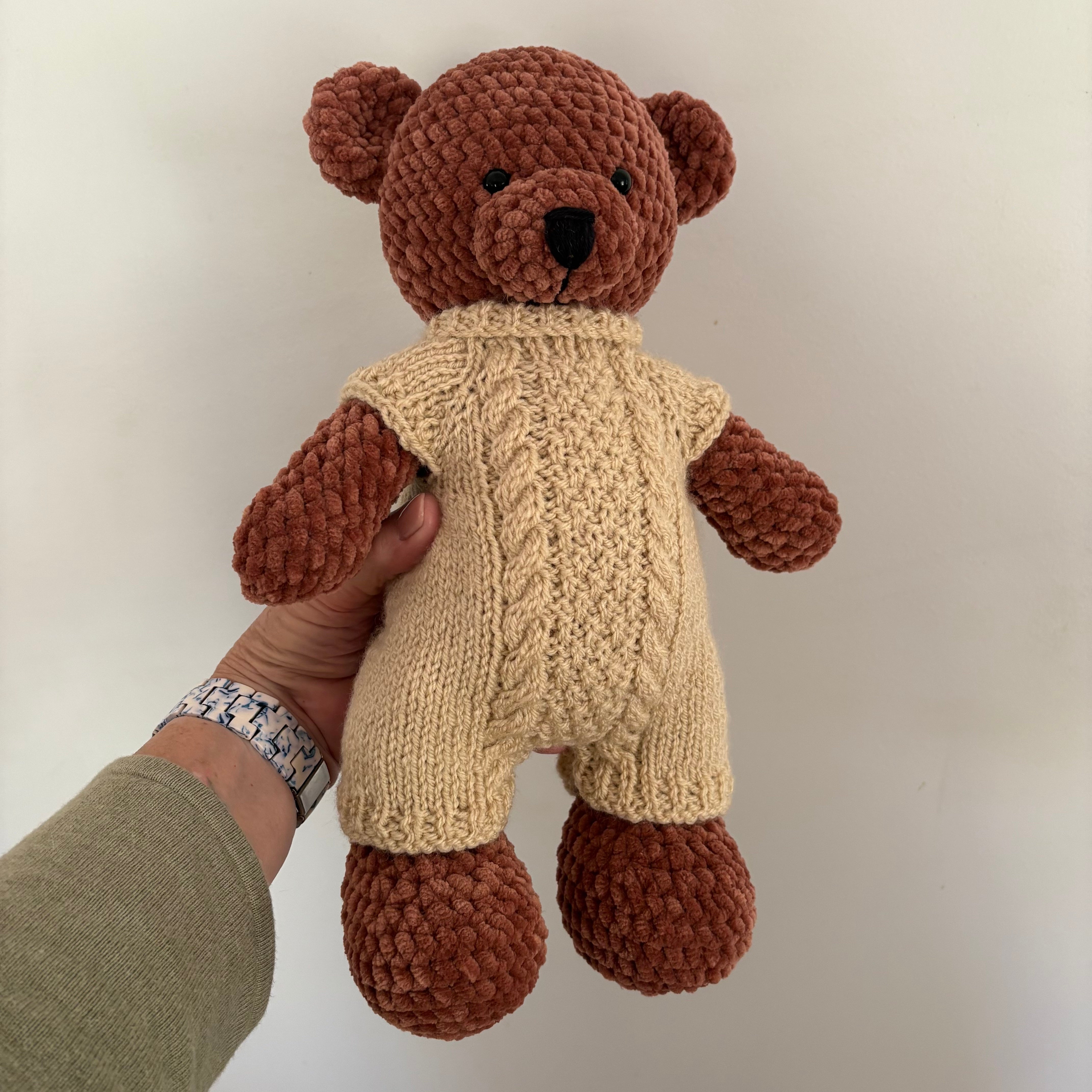 crochet bear in knitted onesie