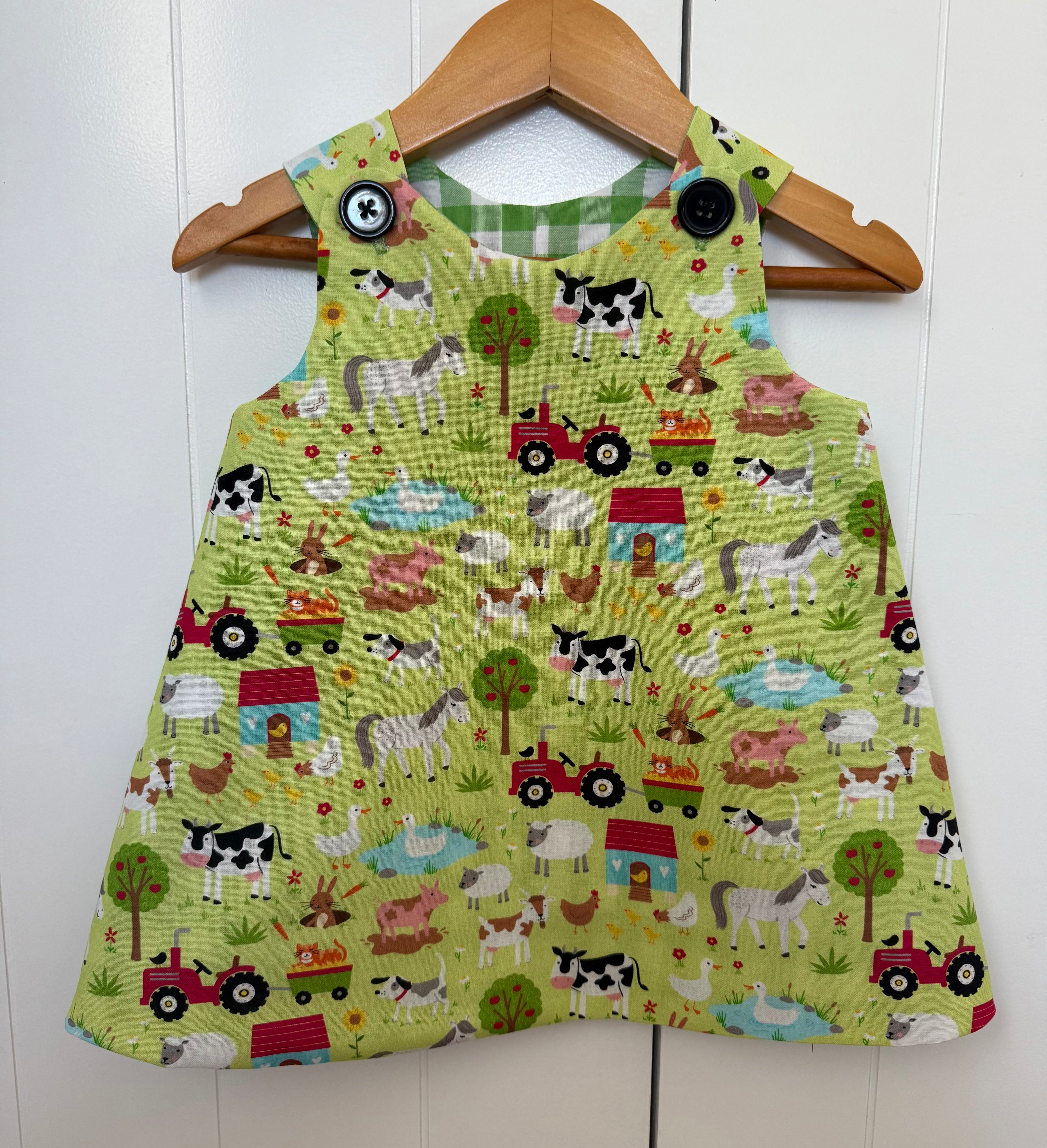 Girls farmyard pinafore size 1