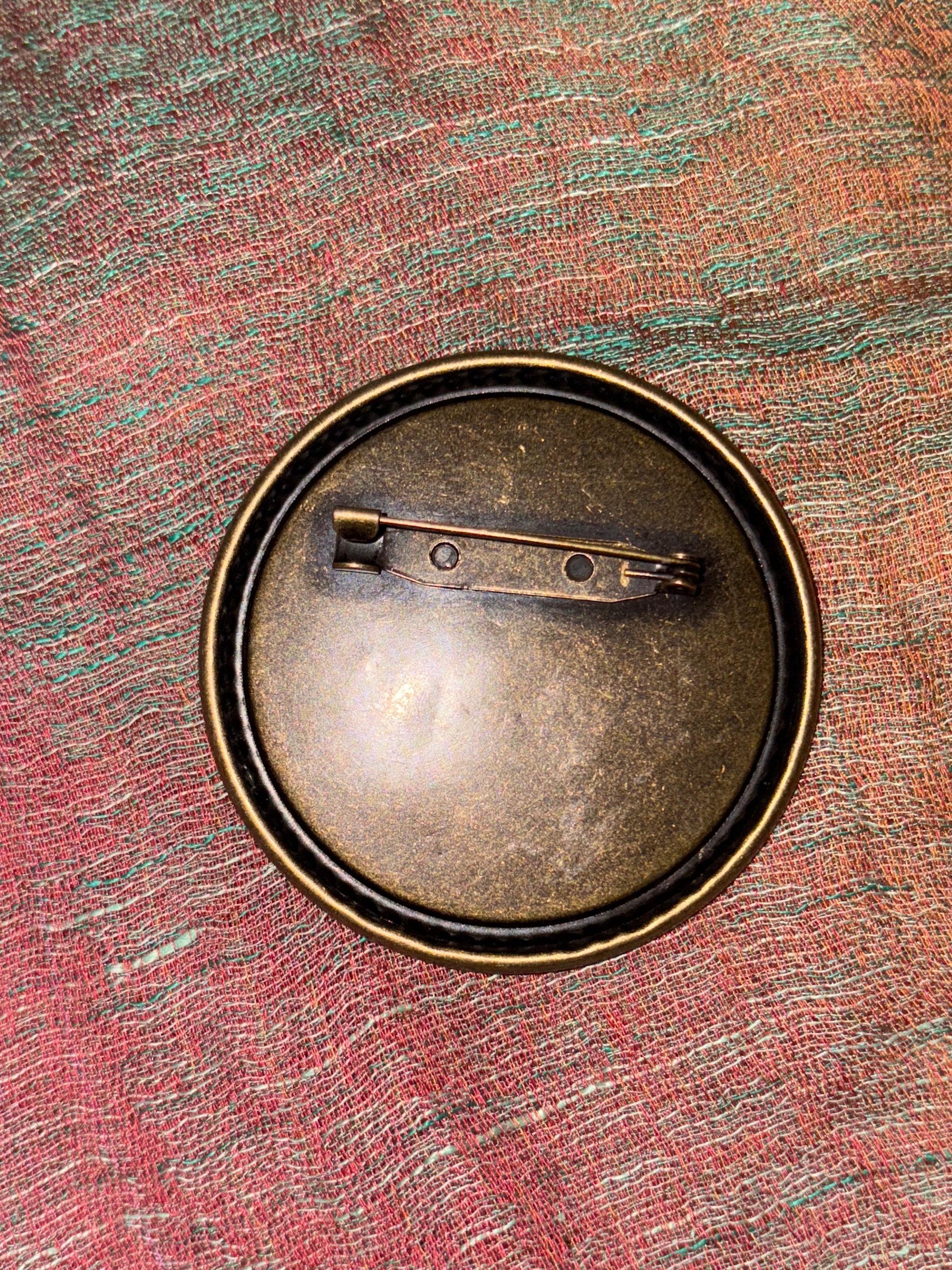 Classic navy and white handstitched brooch