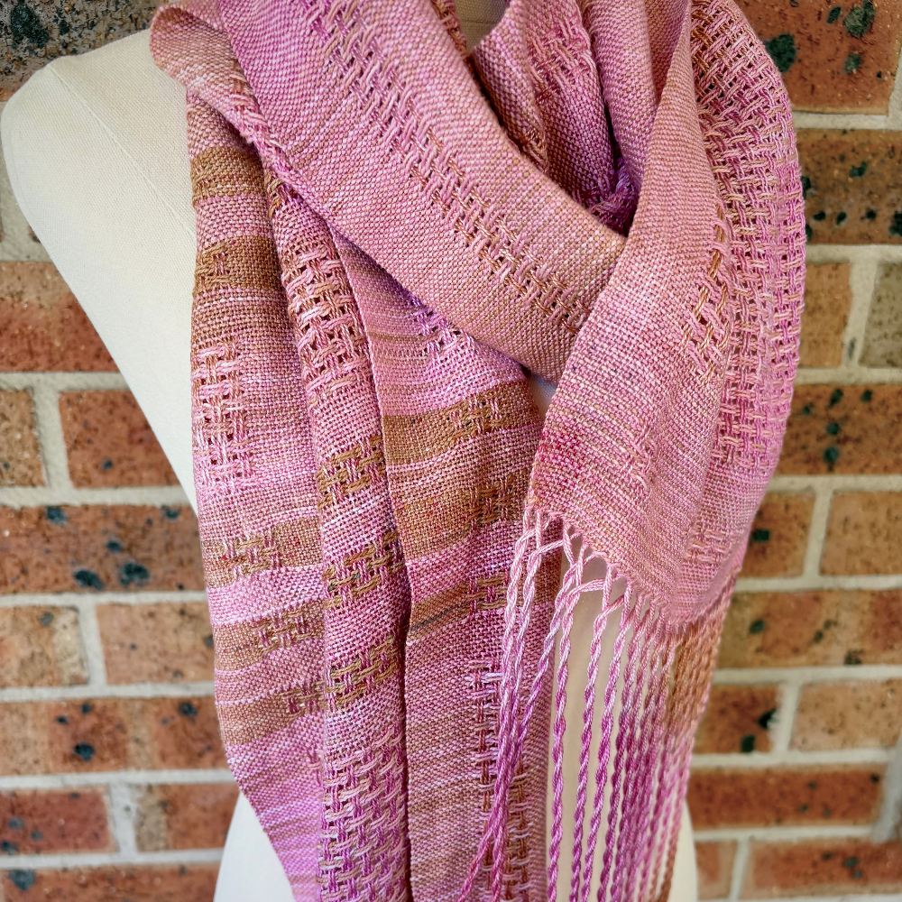 Light-pink-tencel-scarf-draped-mannequin-handwoven-entangled-happiness-handwovens