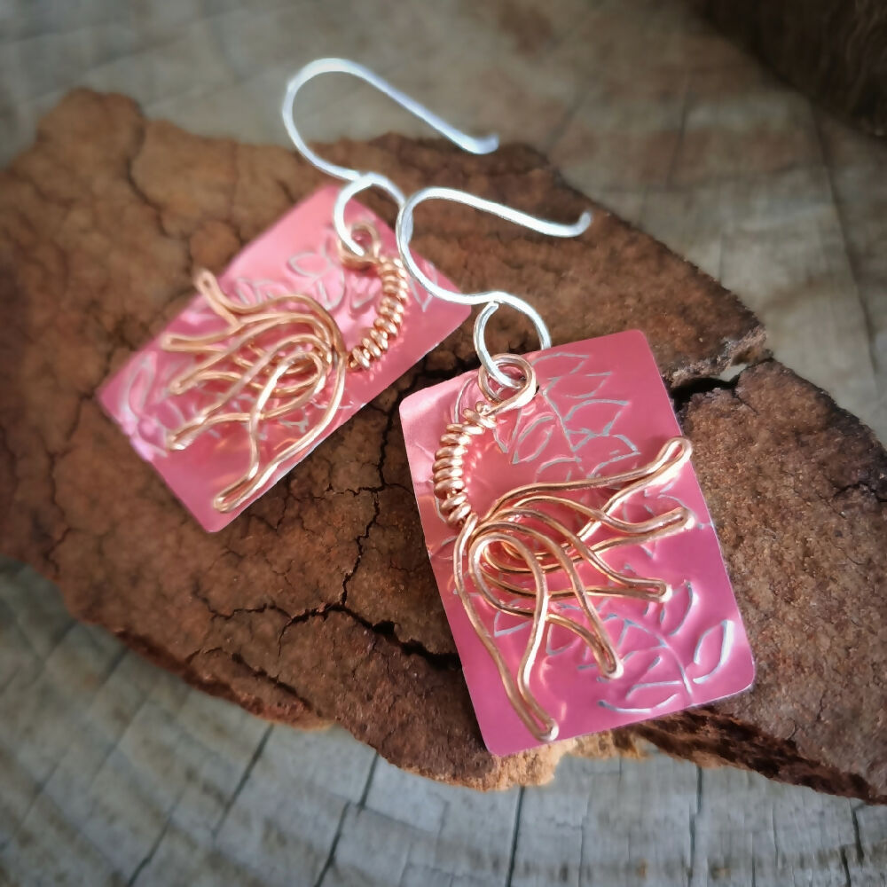 pink upcycled drink can earrings handmade with copper flower and sterling silver