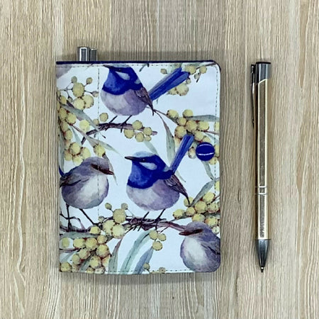 Wrens refillable fabric pocket notepad cover with snap closure. Incl. book and pen.