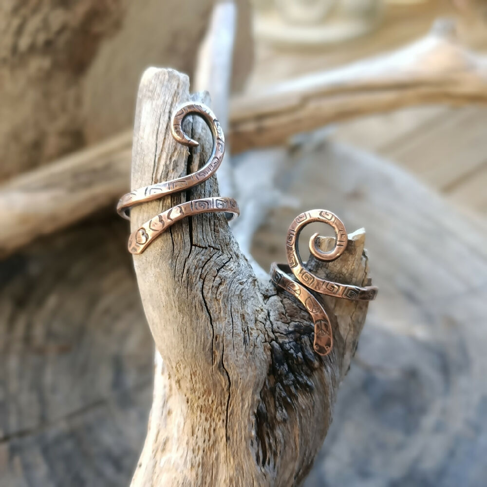 snake rings on branch copper