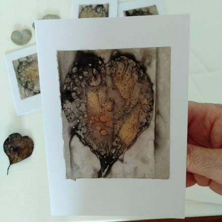 Card hand printed with heart leaf