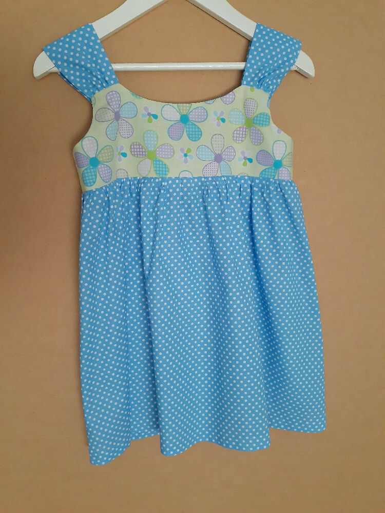 Cute child's dresses sizes 1-6. One-Of-A-Kind Print Bodice with Contrasting Spotty Skirt & Straps.