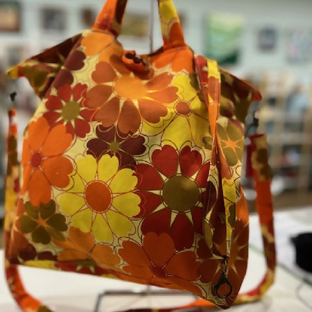 gorgeous orange daisy drill shopper bag