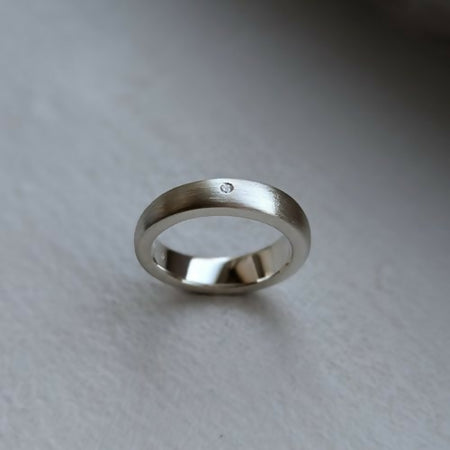 handmade offset ring × with diamond