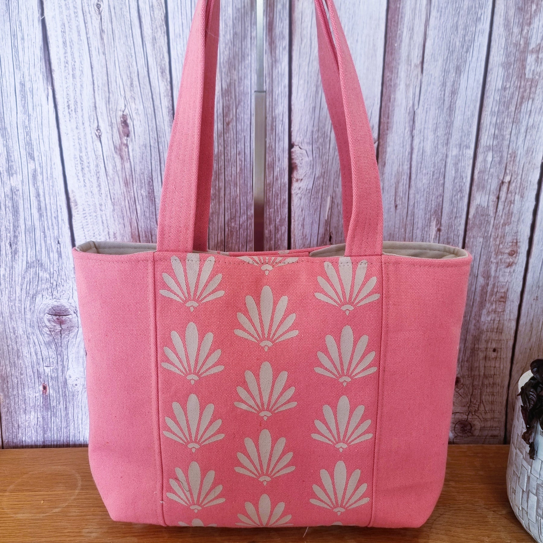 Upcycled tote bag - coral pink with fan/fleur de lis design