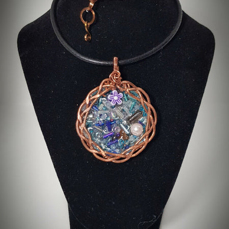 Resin beaded circular pendant, hand beaten plait with leather cord (#658AM/N)