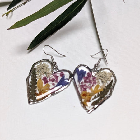 Pressed flowers in resin, heart-shaped, wildflowers
