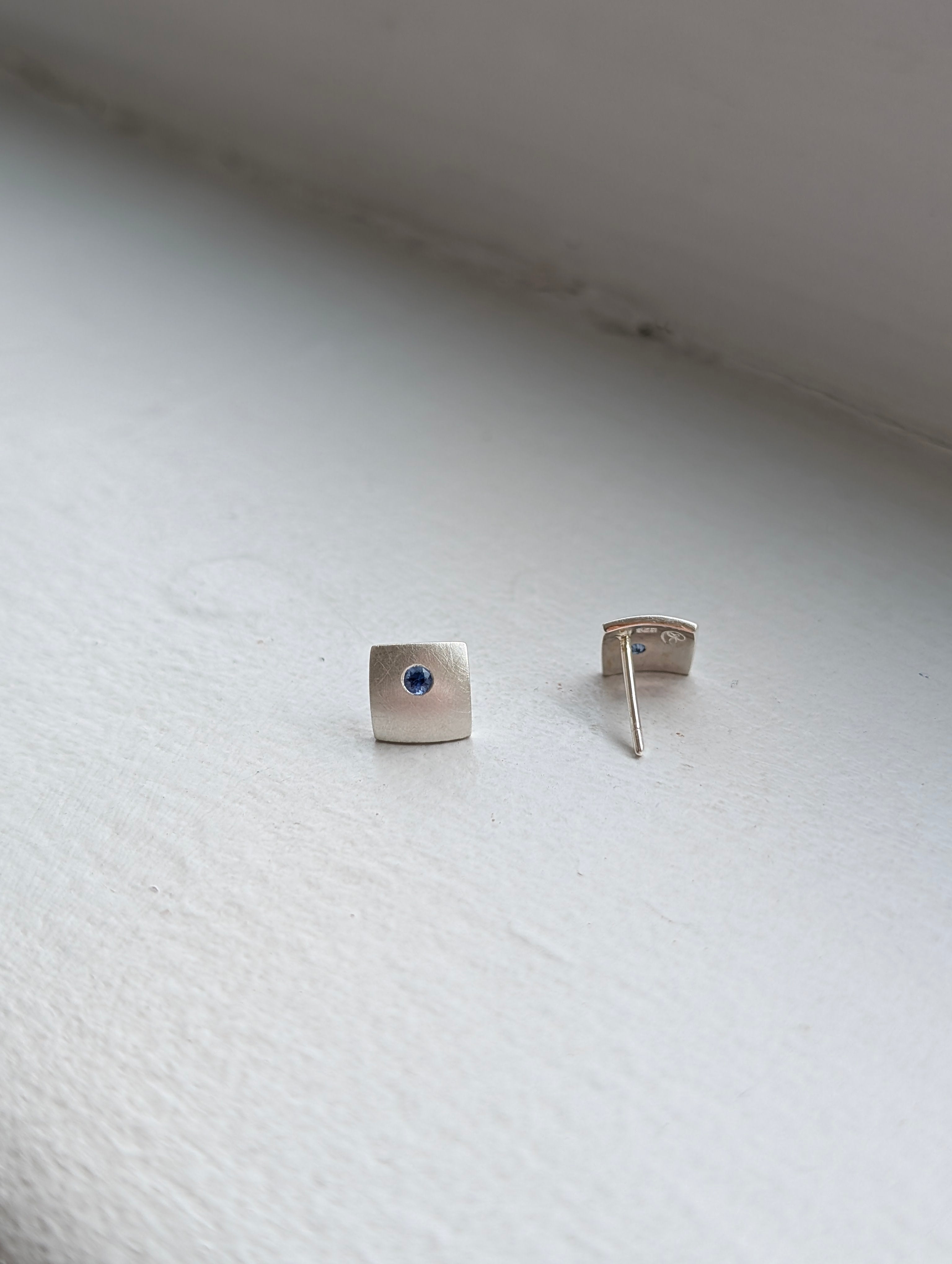 blue sapphires × domed square studs