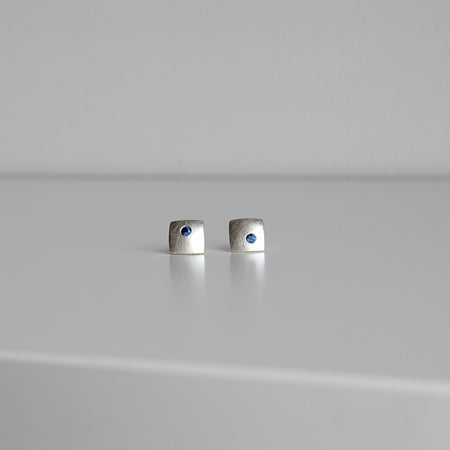 blue sapphires × domed square studs