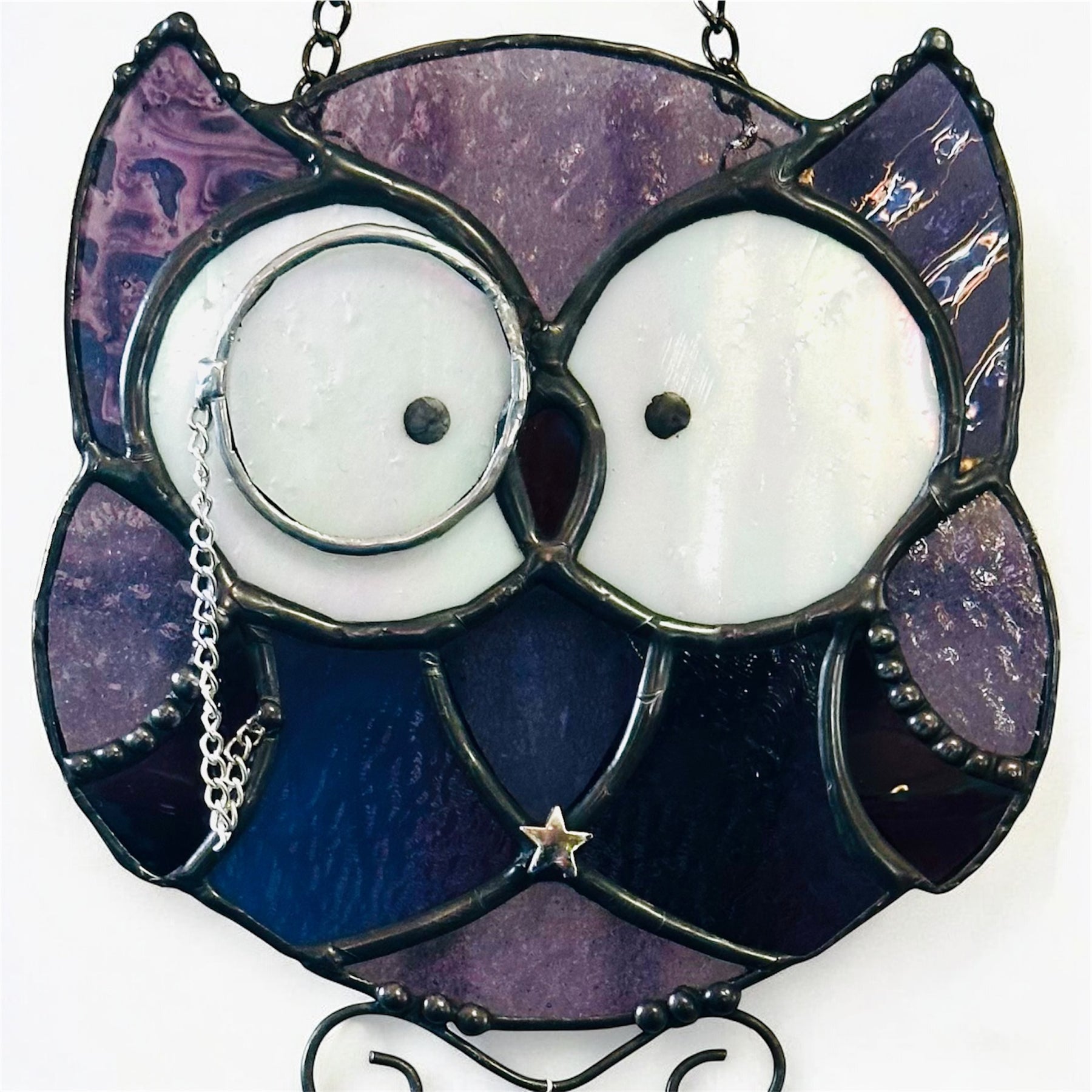 Purple stained glass owl