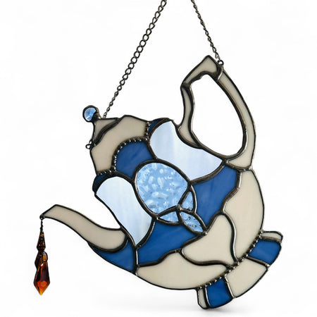 Spill the “T” sun catcher