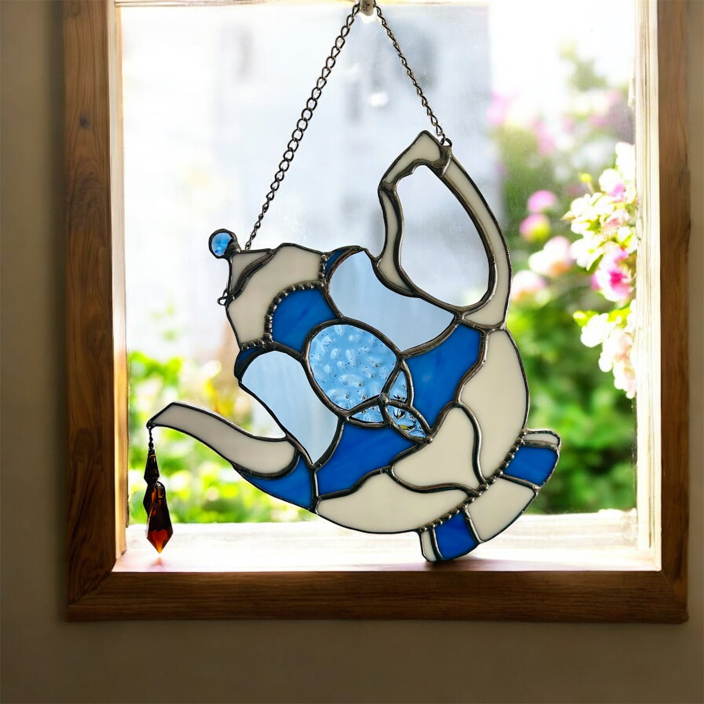 Spill the “T” sun catcher