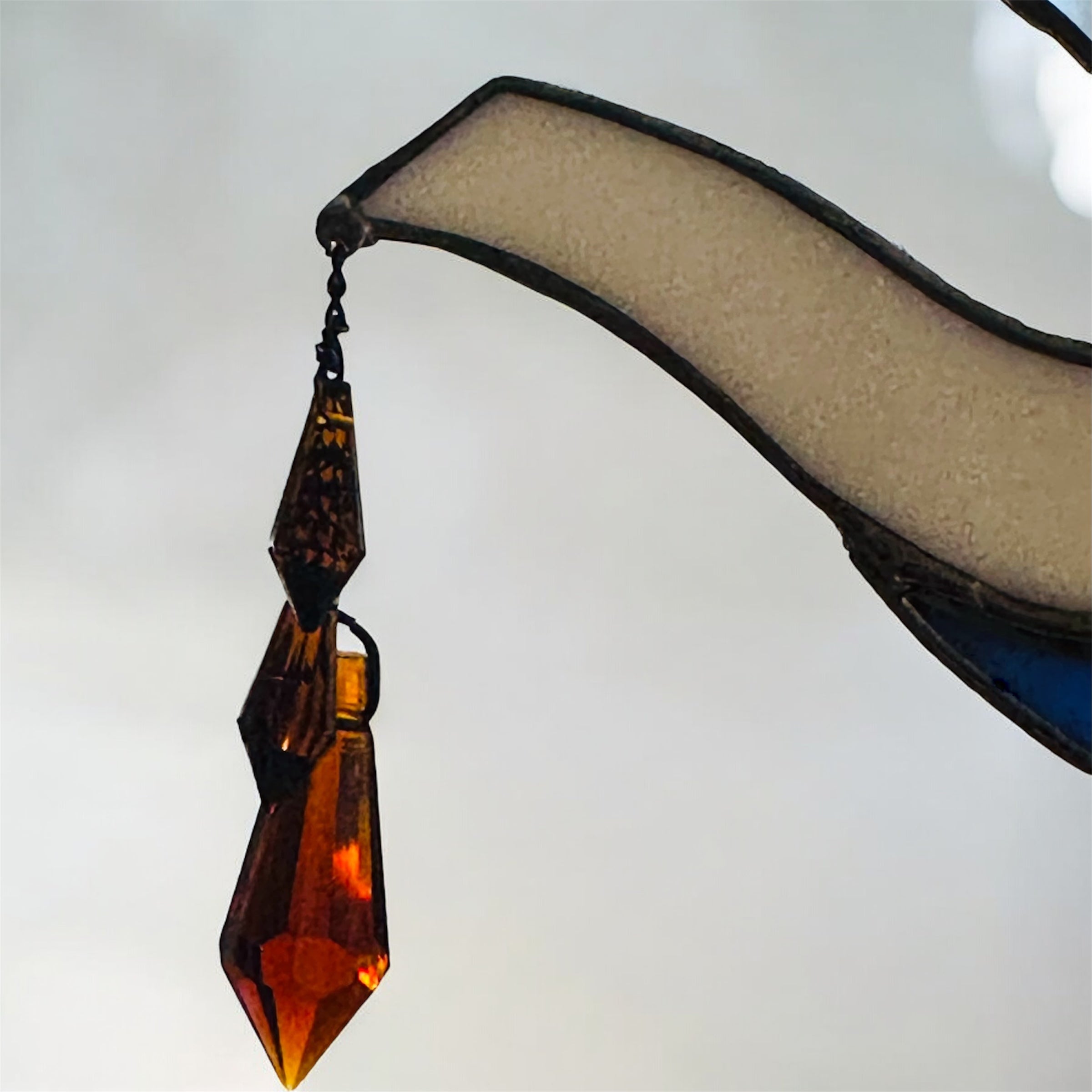 Spill the “T” sun catcher