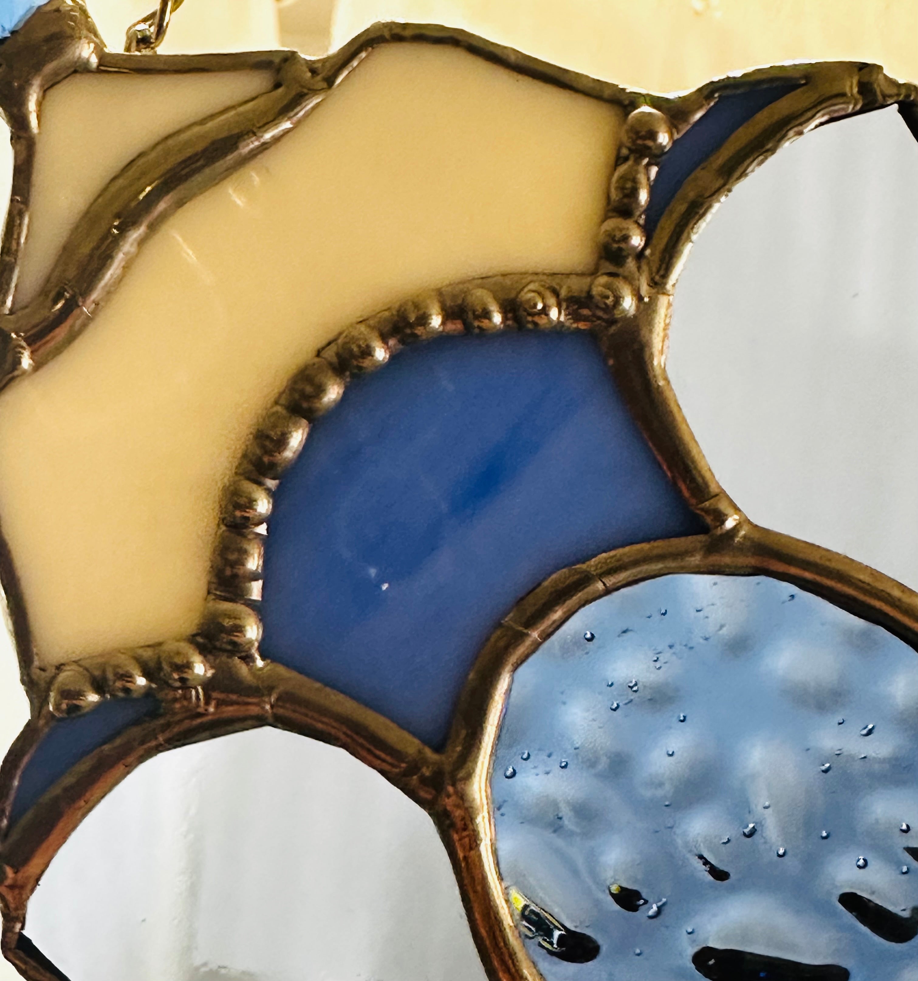 Spill the “T” sun catcher