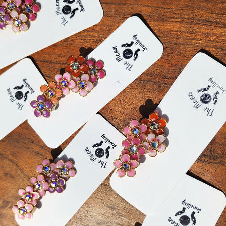 Shine bright with floral glamour — clip it on, no piercing required!