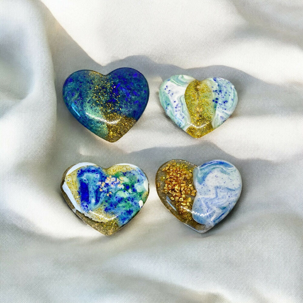 Set of four blue and gold magnets