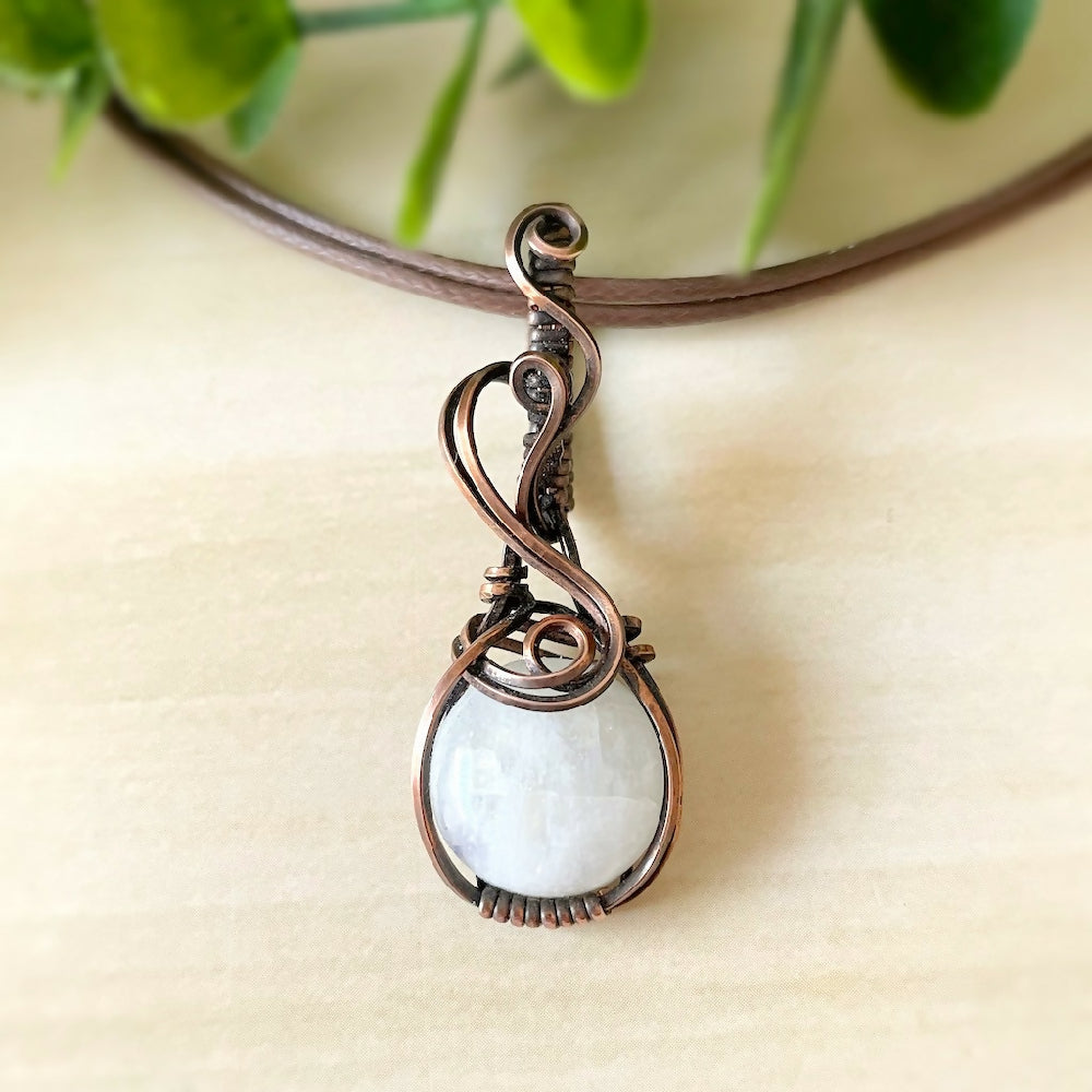 Captivating 47x17mm Wire-Wrapped Rainbow Moonstone Pendant