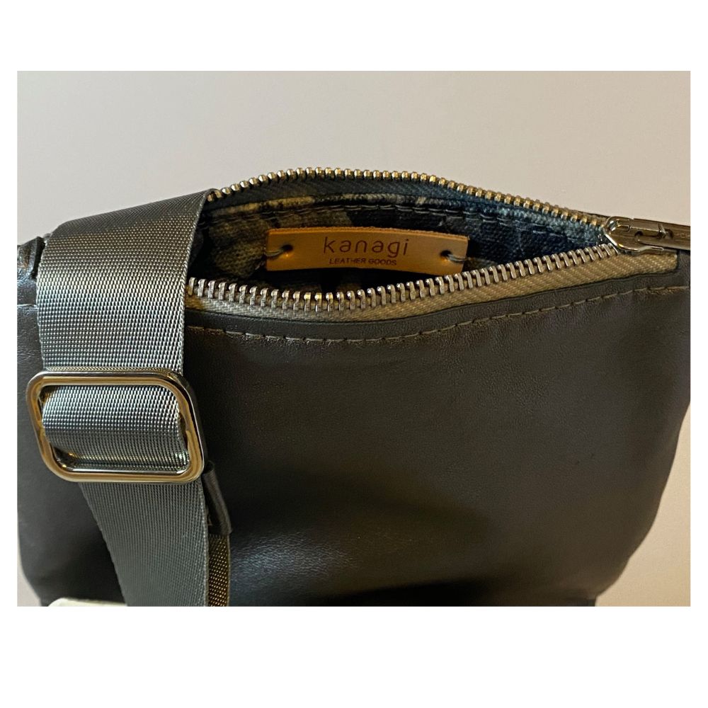 Metallic steel grey crossbody zip top pouch