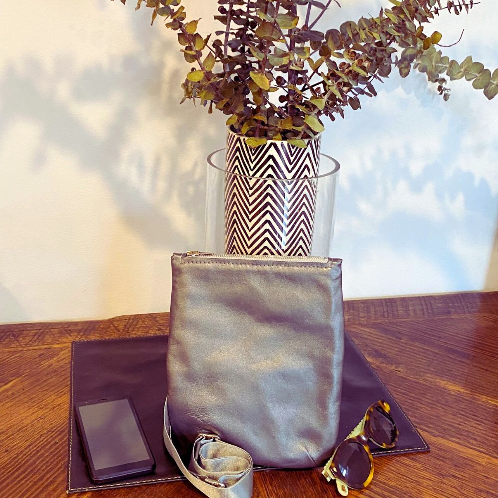 Metallic steel grey crossbody zip top pouch