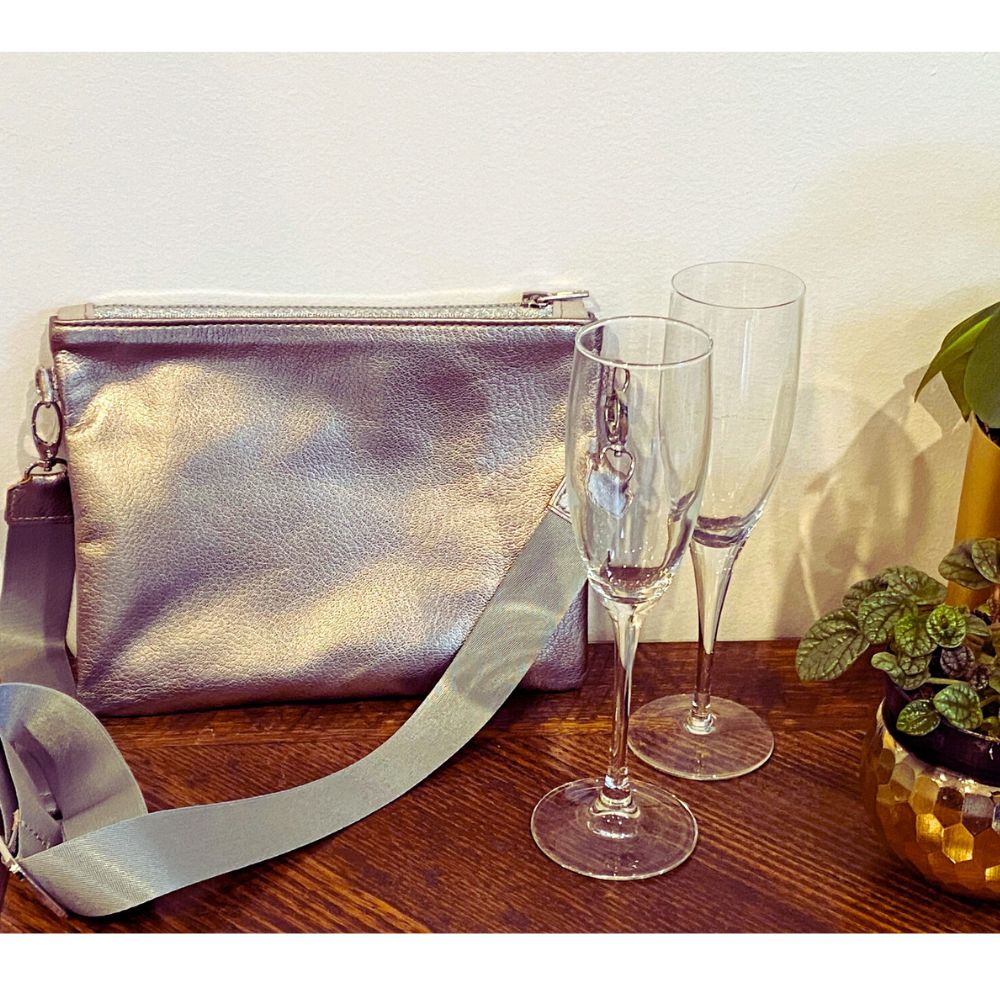 Metallic silver zip top crossbody bag