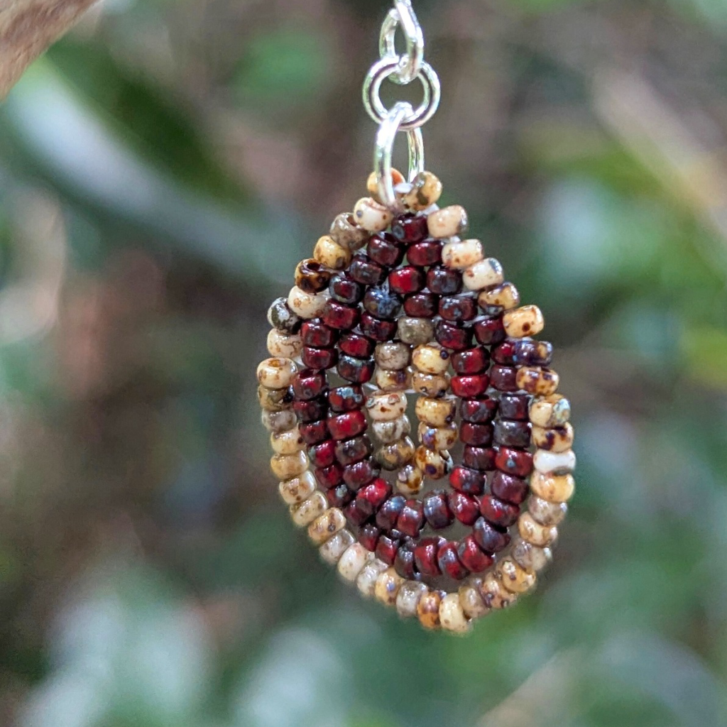 Droplet earrings | Hand stitched | Sterling silver ear hooks | Red and brown with a unique Picasso finish