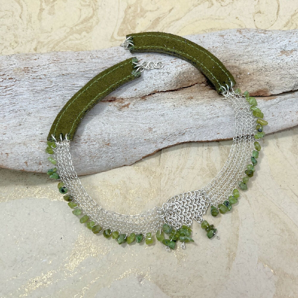 Knitted fine silver with peridot and leather necklace back
