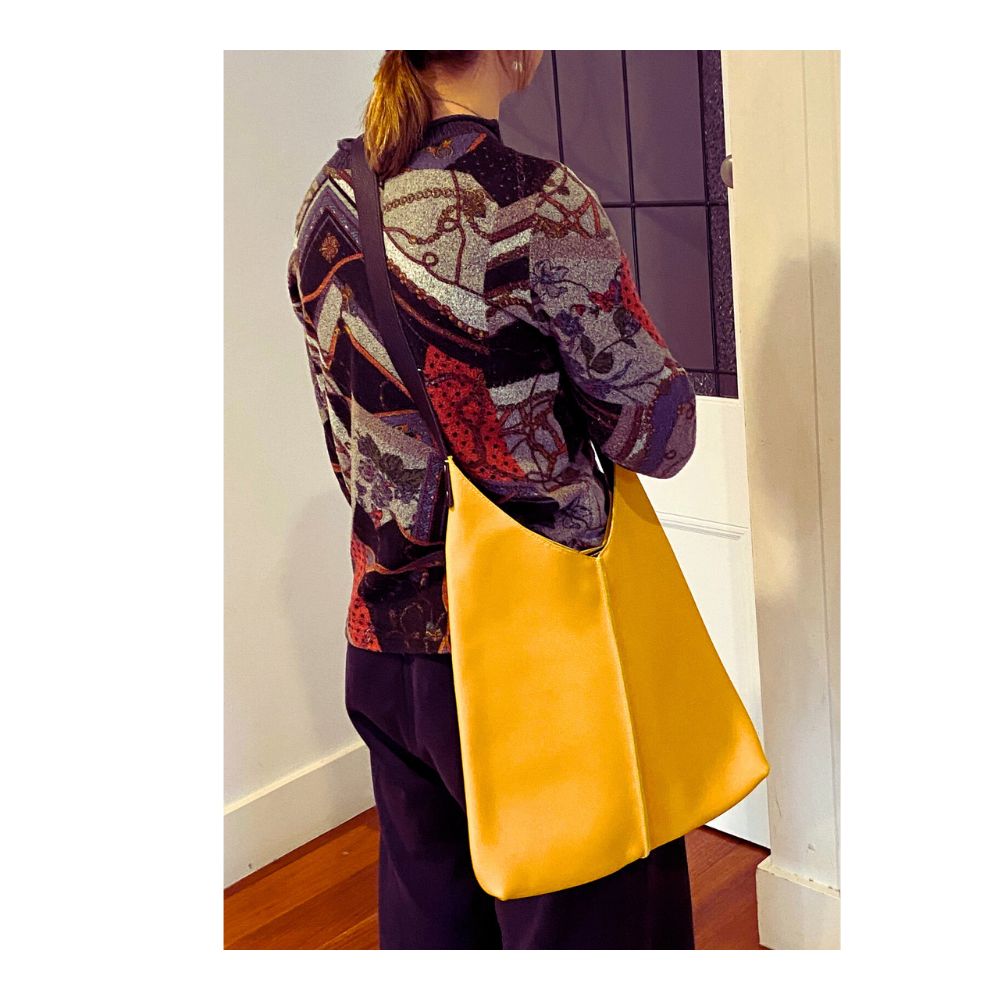 Saffron wedge-shaped tote bag