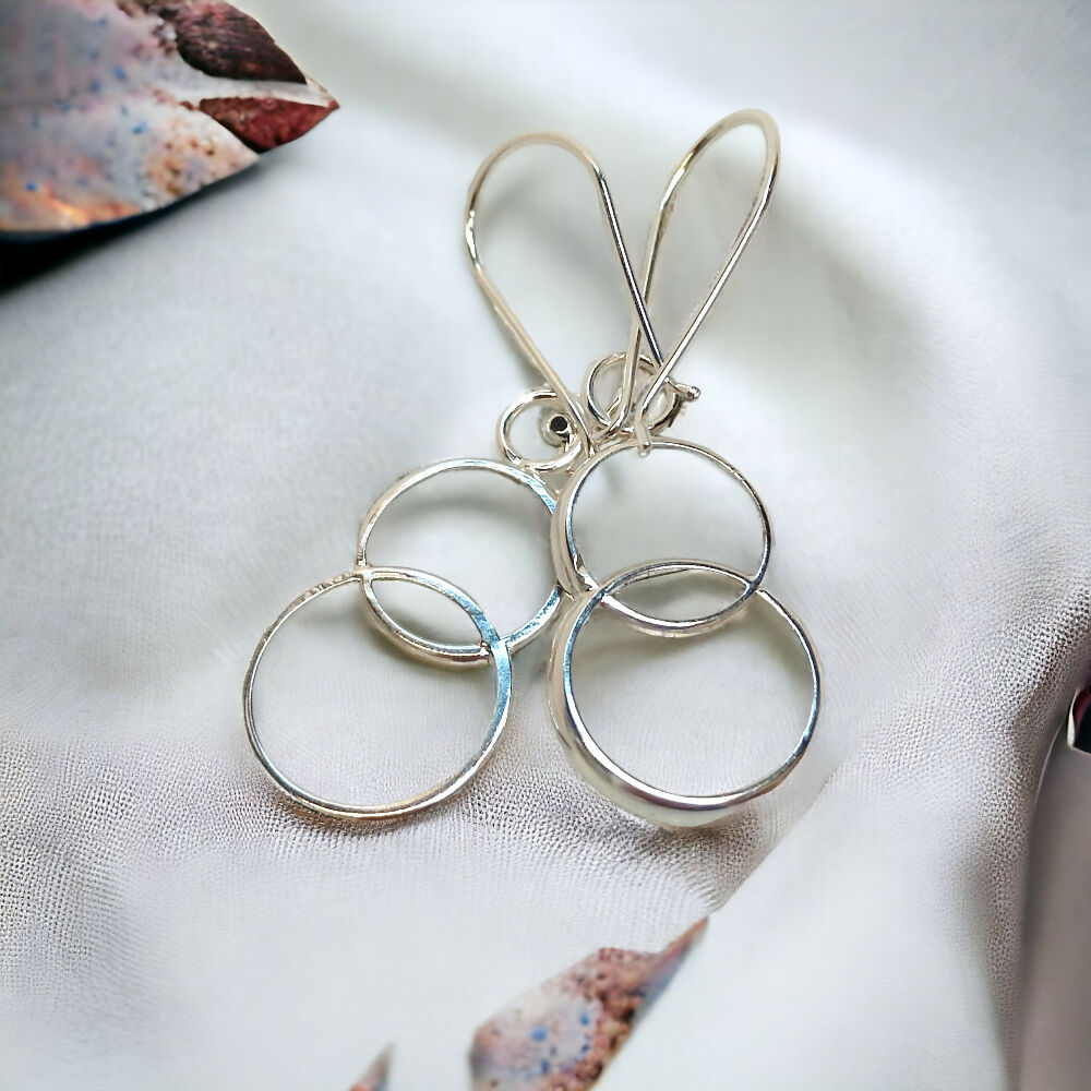 Vintage double ring sterling silver spoon earrings.
